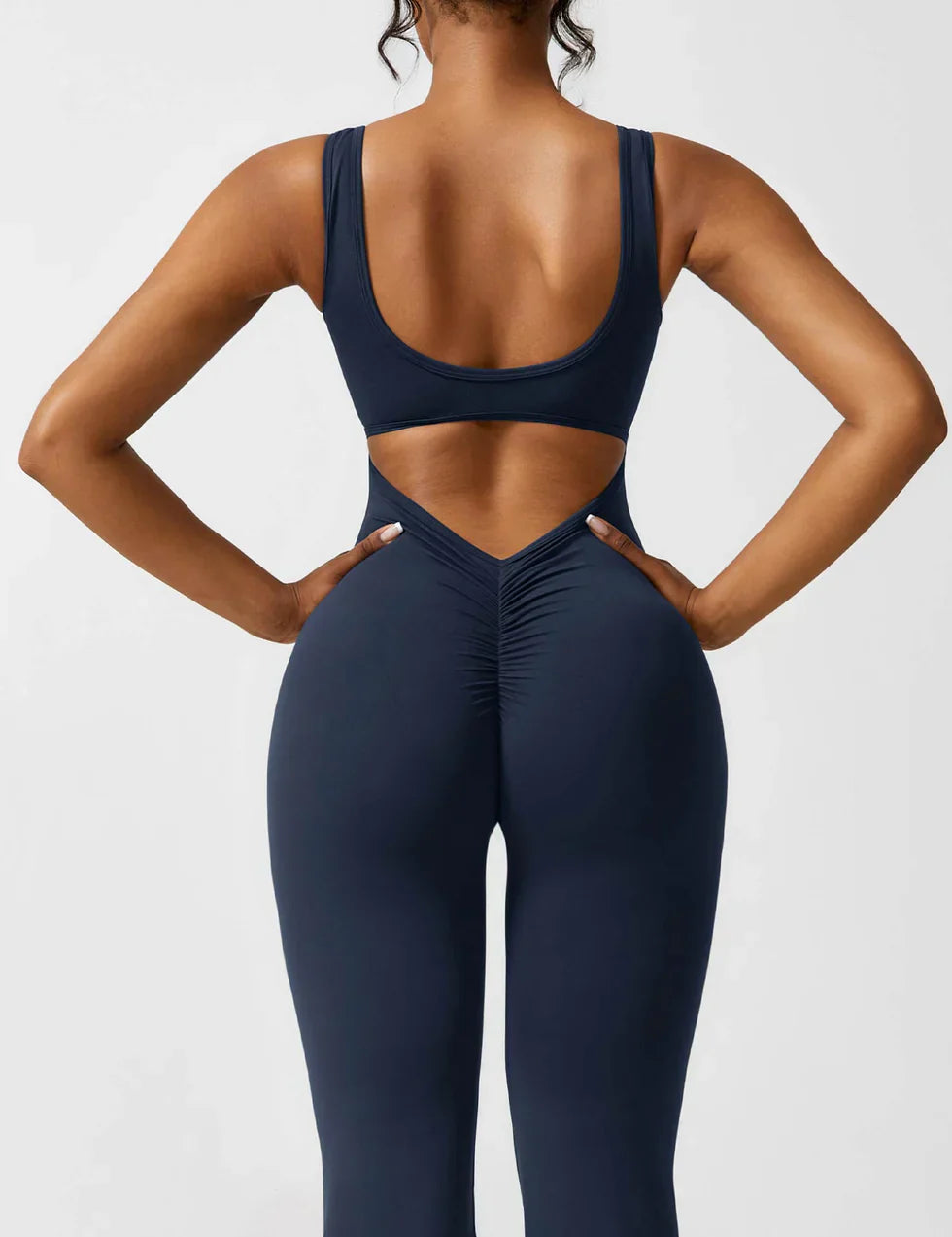 Noor Verfijnd | Flared V-Back Jumpsuit met Shaping Effect