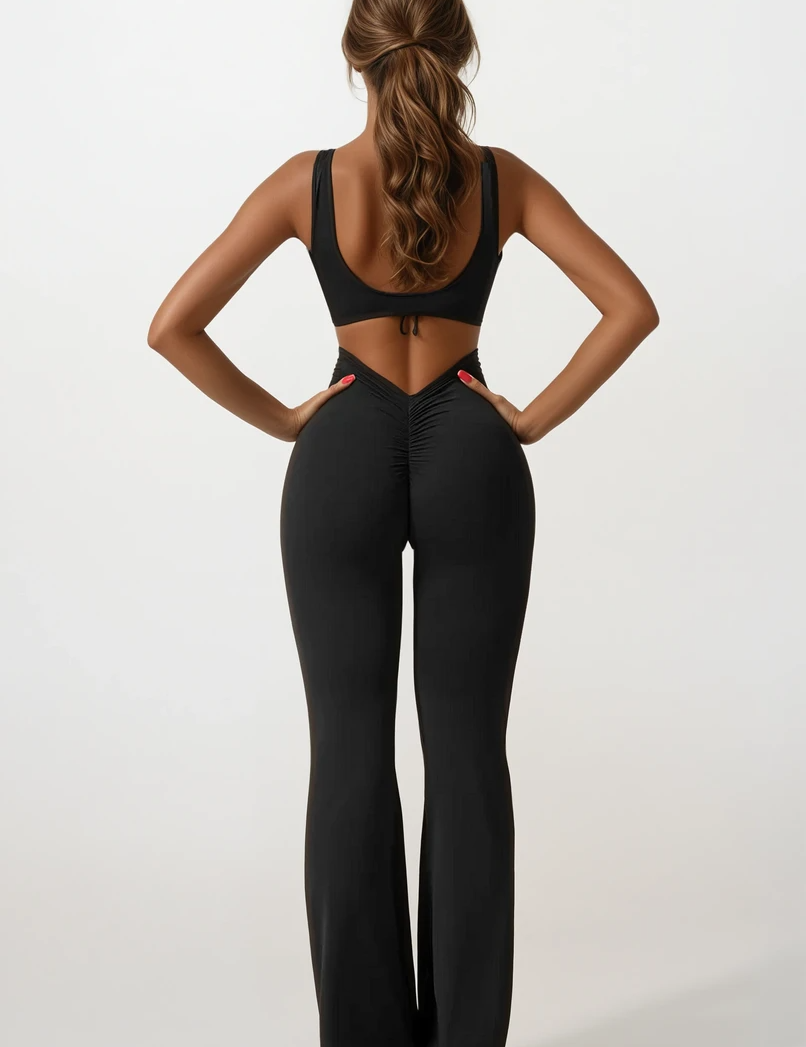 Noor_Verfijnd_Flared_V-Back_Jumpsuit_met_Shaping_Effect_Zwart_Achter.png